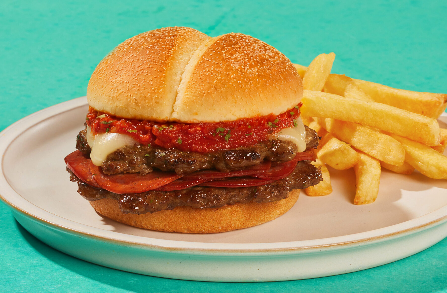 Pizza burgers topped pizza-style
